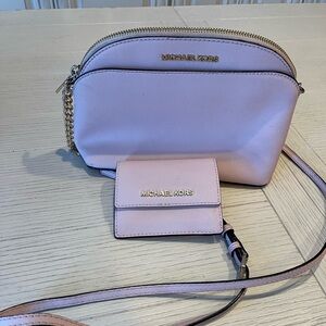 Pink Michael Kors crossbody purse and matching wallet
